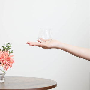 “Aderia” Craft Sake Glass Rich Aroma, on a hand