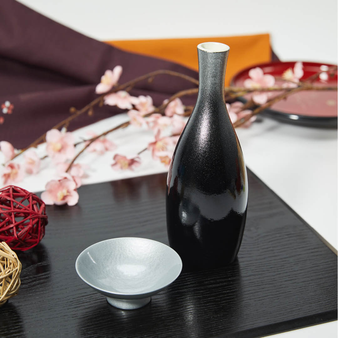Porcelain Sakazuki Cup With Silver Urushi Lacquer, on a table